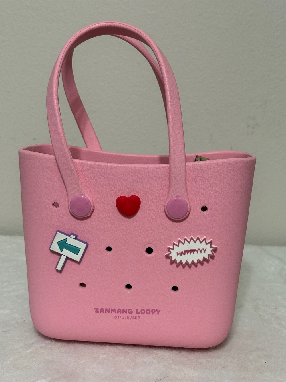 Pink Tote Bag with Playful Charm Accents